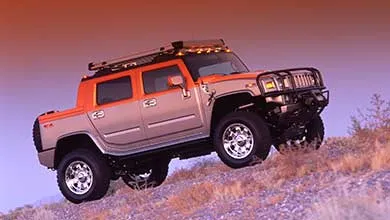 Hummer on top of a hill