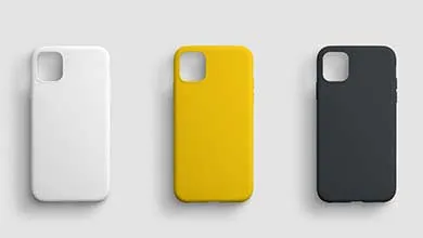 Three smartphone cases—white, yellow, and black—arranged horizontally on a light gray background.
